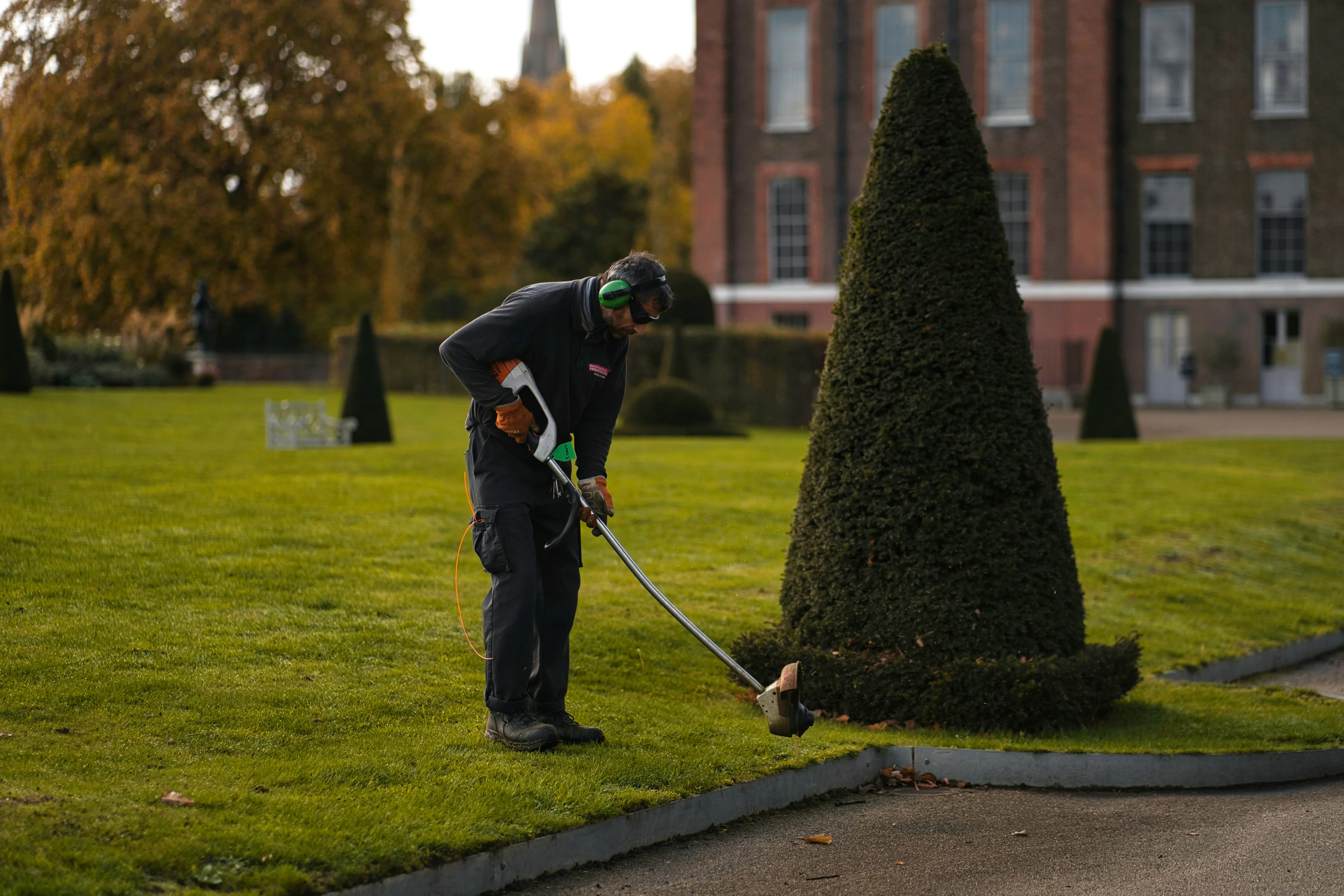 Landscaping professional working on a residential property